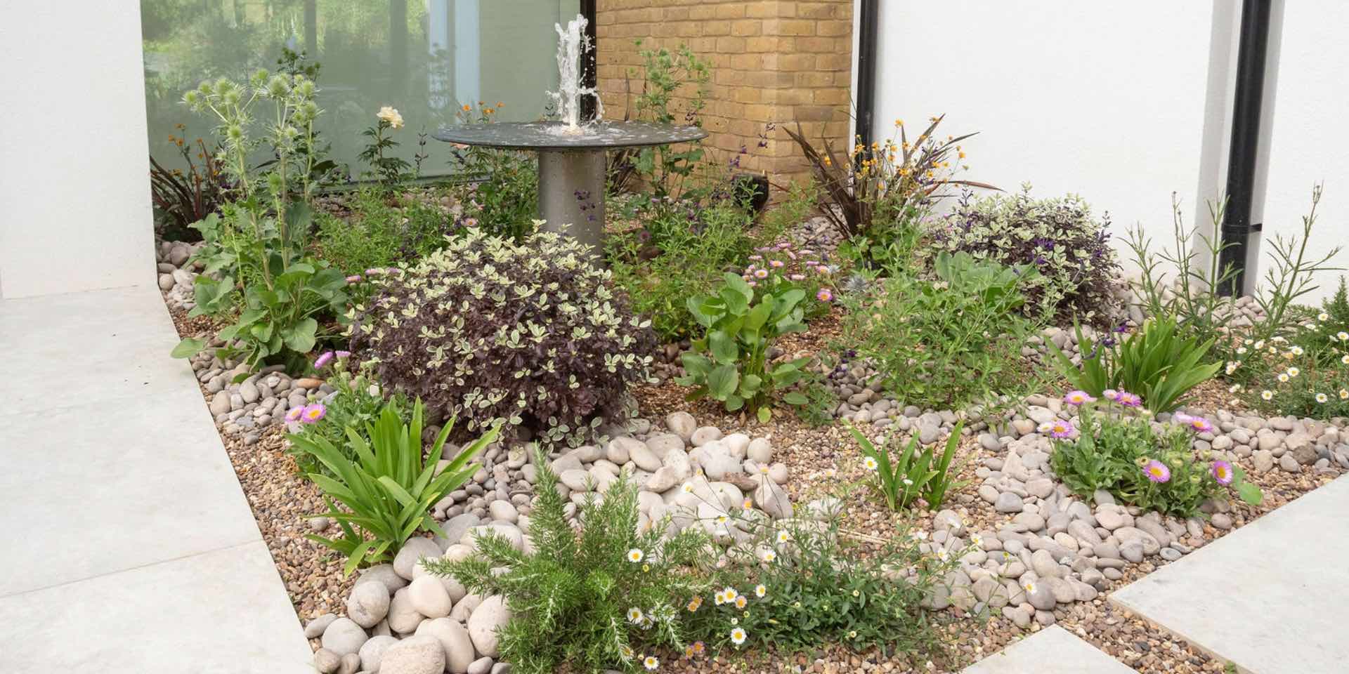Mediterranean pebble planting with Foras Sea Salt water feature
