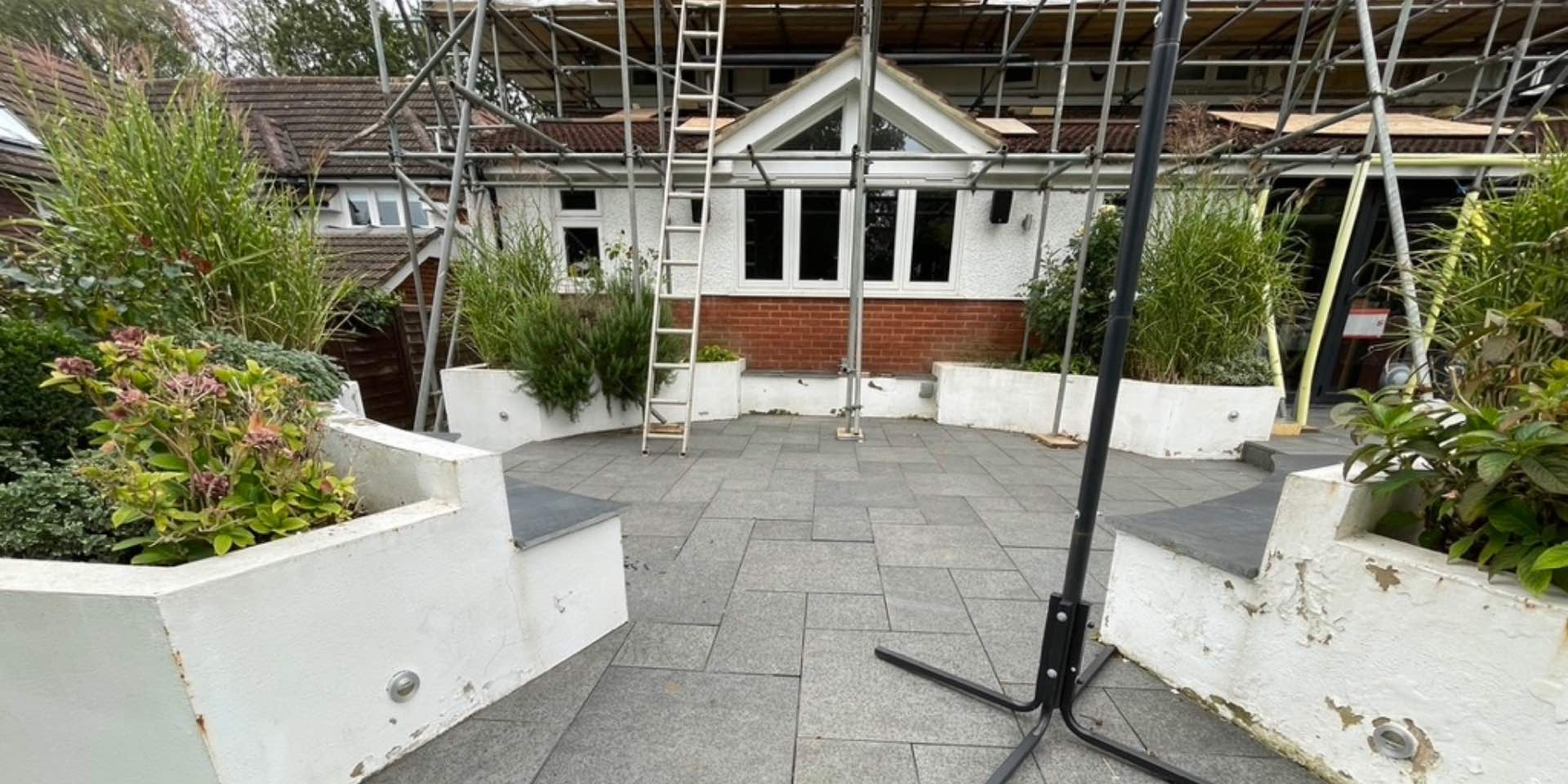 Park Hill Harpenden garden before re-design with white rendered walls and circular patio