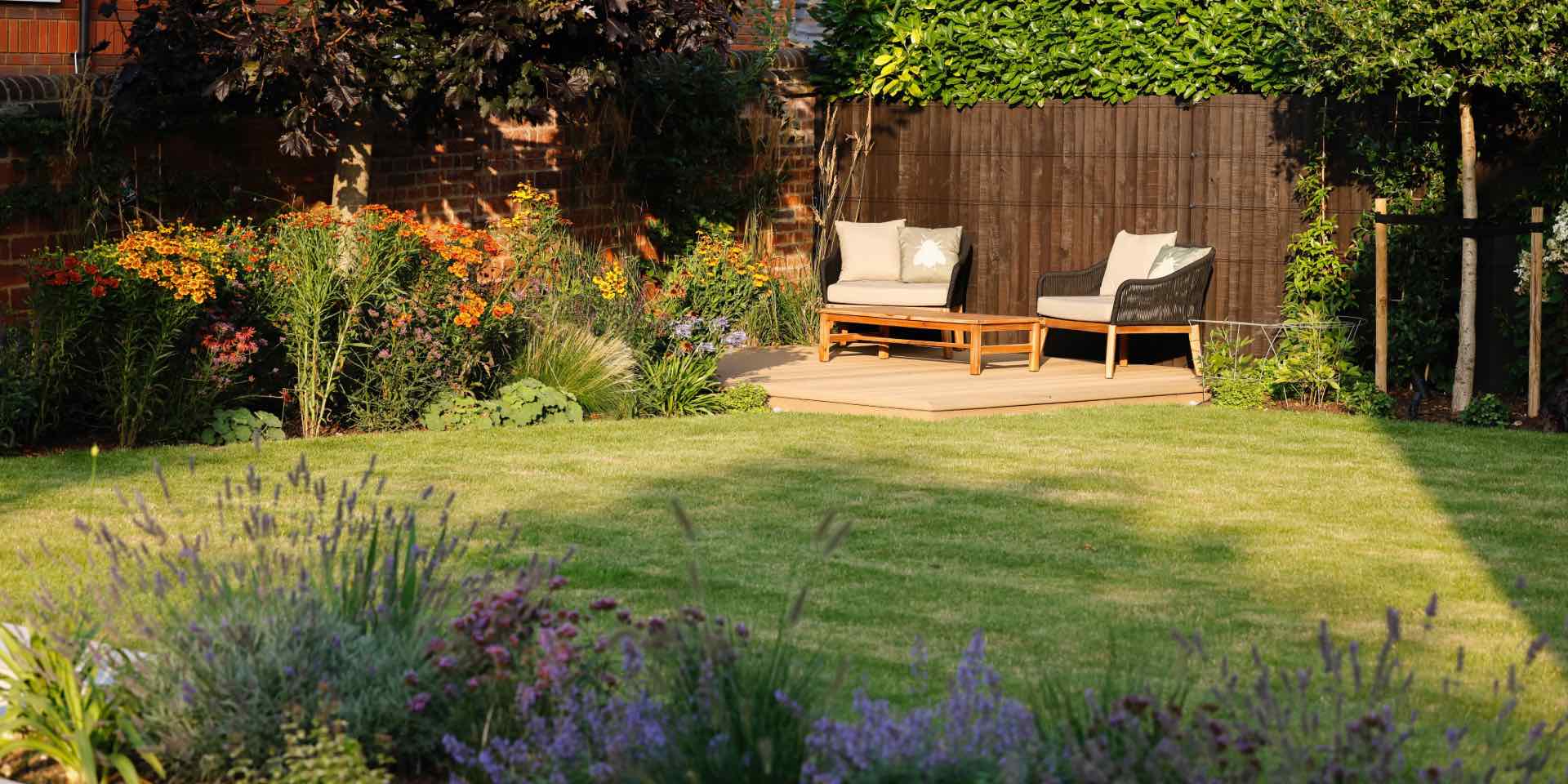 Large Hitchin country garden with colourful plants
