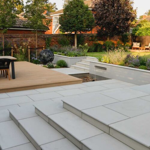 Sunken garden with corner steps and decking